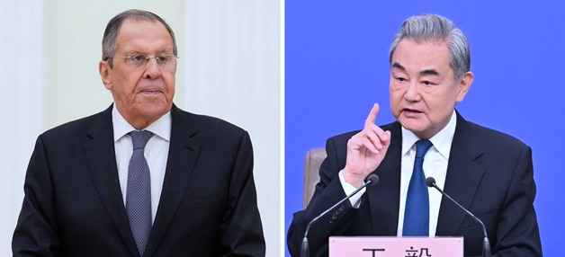 Serguei Lavrov, ministro de Asuntos Exteriores de Rusia y Wang Yi, ministro de Relaciones Exteriores de China.